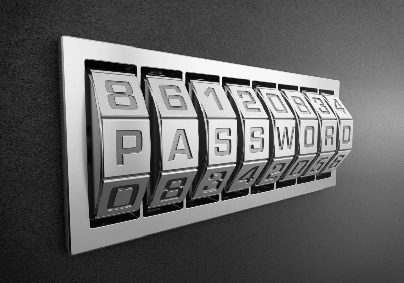 Zahlenschloss als Zahlenräder mit dem Wort: Password